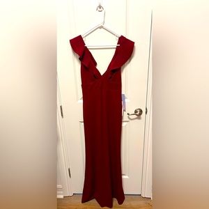 Maroon long cocktail dress. Never worn size 7/8